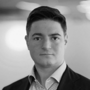 Professional headshot of Mike Rubino in business attire